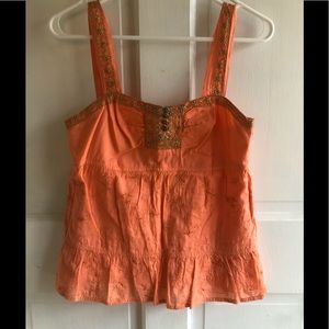 Express XS orange tank with gold stitching